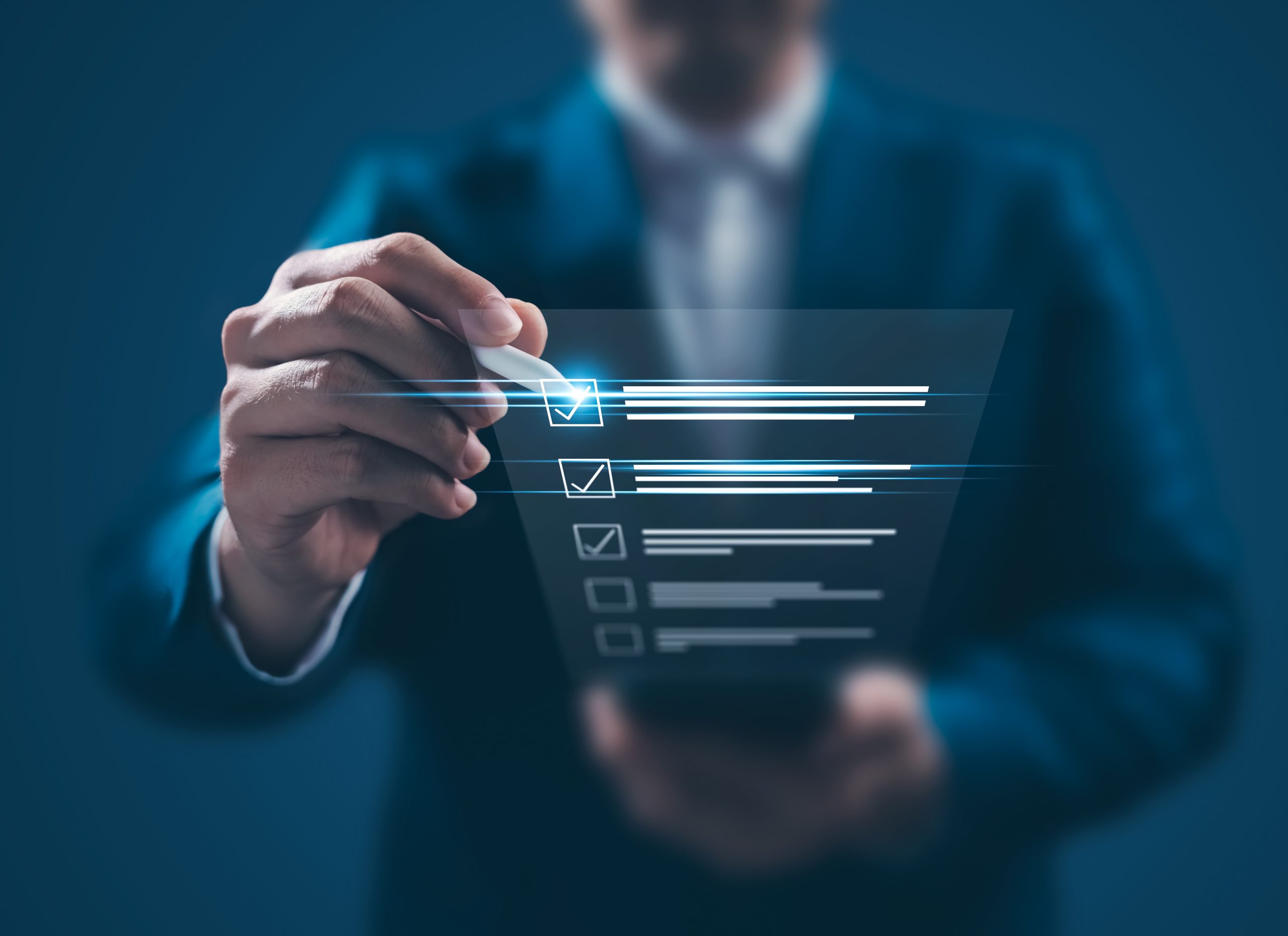 business man holding digital list